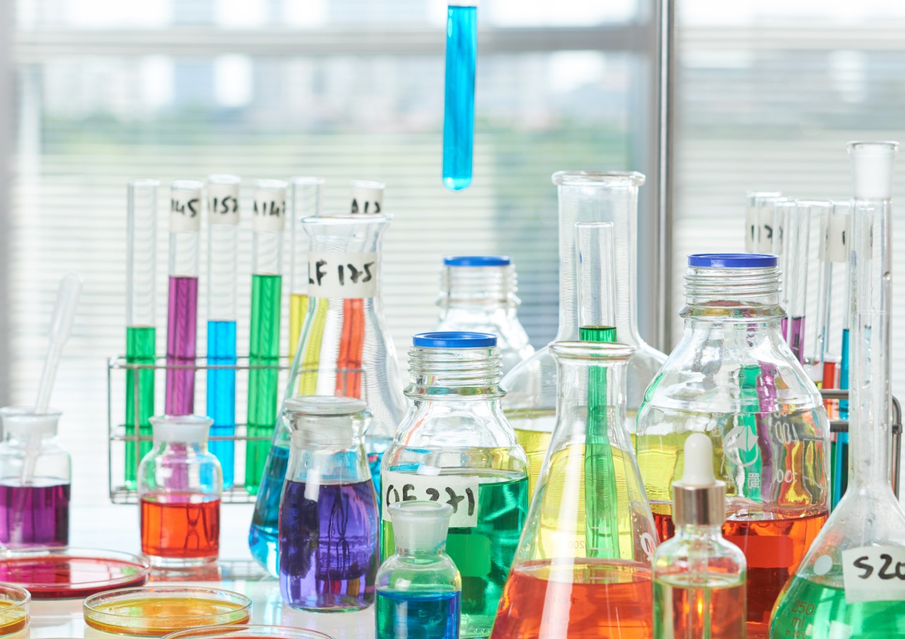 coloured solutions in bottles in laboratory